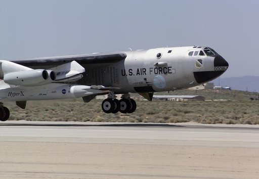 NASA's B-52B launch aircraft takes off carrying the second X-43A hypersonic research vehicle attached to a modified Pegasus rocket, on March 27, 2004