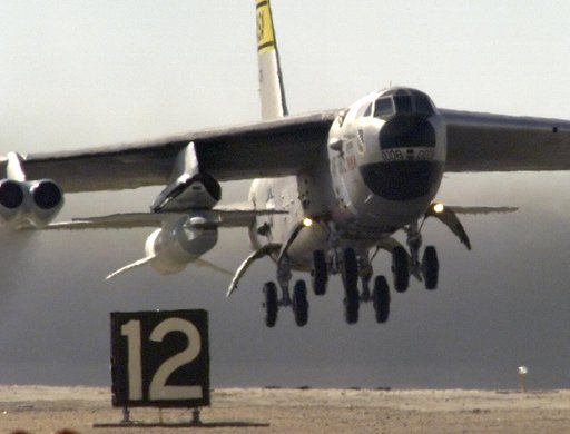 NASA's B-52B launch aircraft takes off carrying the third X-43A hypersonic research vehicle attached to a modified Pegasus rocket, on November 16, 2004