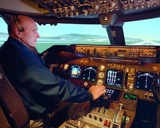 NASA research pilot Gordon Fullerton checked out how the PCA software worked in the multi-engine simulator at NASA Ames before fight-testing PCA in an MD-11.