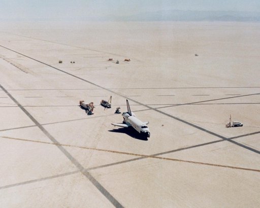 The Space Shuttle Columbia on Rogers Dry lakebed at Edwards AFB after landing to complete its first orbital mission on April 14, 1981