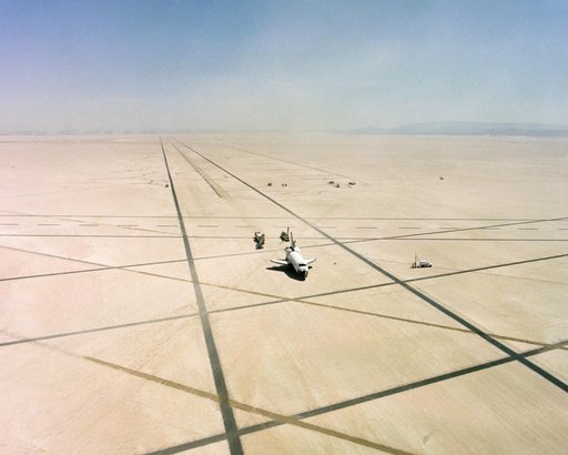The Space Shuttle Columbia on Rogers Dry lakebed at Edwards AFB after landing to complete its first orbital mission on April 14, 1981