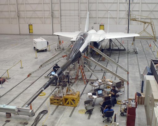 NASA Dryden's F-15B aircraft with the Gulfstream Quiet Spike sonic boom mitigator attached undergoes ground vibration testing in preparation for test flights
