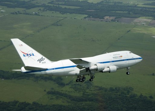 NASA's highly modified Boeing 747SP SOFIA observatory banks low over the Texas countryside as it heads for landing at Waco to conclude its second check flight