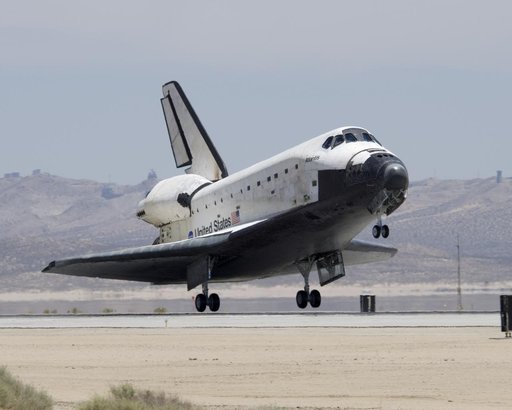 The Space Shuttle Atlantis touches down at Edwards AFB on June 22, 2007, to conclude International Space Station construction and supply mission STS-117