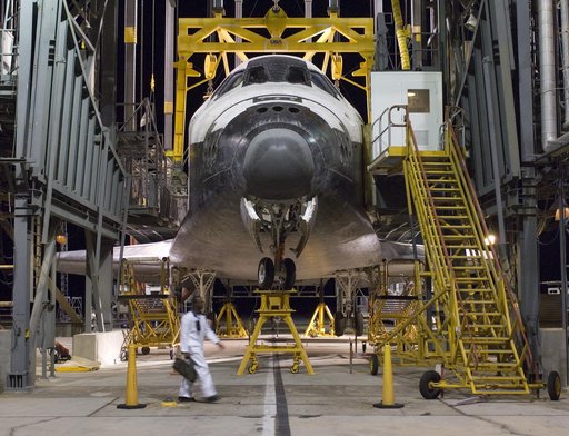 The Space Shuttle Atlantis receives post-flight servicing in the Mate-Demate Device (MDD) at NASA's Dryden Flight Research Center, Edwards, Calif.