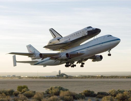 NASA's 747 Shuttle Carrier Aircraft with the Space Shuttle Atlantis on top lifts off to begin its ferry flight back to the Kennedy Space Center in Florida