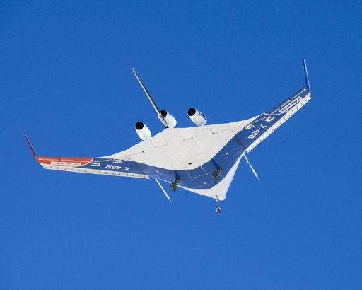 A pristine blue sky backdrops the X-48B Blended Wing Body aircraft during the aircraft's first flight July 20, 2007, from NASA's Dryden Flight Research Center