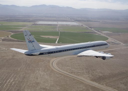 Agricultural fields spread out beyond NASA's DC-8 airborne science laboratory as it heads for landing at Air Force Plant 42 in Palmdale, Calif.
