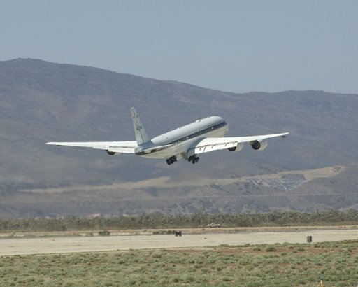 NASA's DC-8 flying laboratory lifts off the runway at Air Force Plant 42 in Palmdale, Calif., on its first flight in the ARCTAS atmospheric science mission