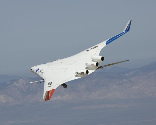 The X-48B Blended Wing Body research aircraft banks smartly in this Block 2 flight phase image