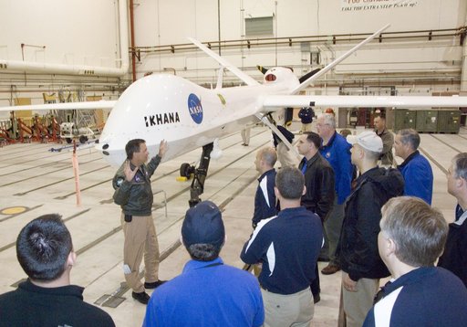 Industrial College of the Armed Forces students on a VIP tour receive a briefing on the Ikhana unmanned air vehicle from NASA Dryden pilot Mark Pestana