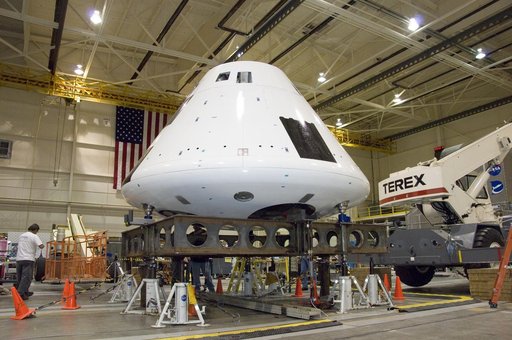 The boilerplate Orion crew module for the Orion Launch Abort System Pad Abort-1 flight test undergoes moment-of-inertia testing at Dryden's Flight Loads Lab.