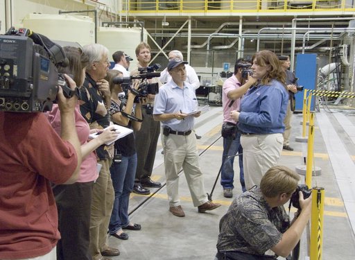 Cathy Bahm, Orion Abort Flight Test integration deputy project manager, briefs news media on the progress of testing in NASA Dryden's Flight Loads Laboratory.