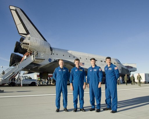STS-126 crewmen Eric Boe, Chris Ferguson, Robert Kimbrough and Stephen Bowen pose in front of the Space Shuttle Endeavour following landing Nov. 30, 2008