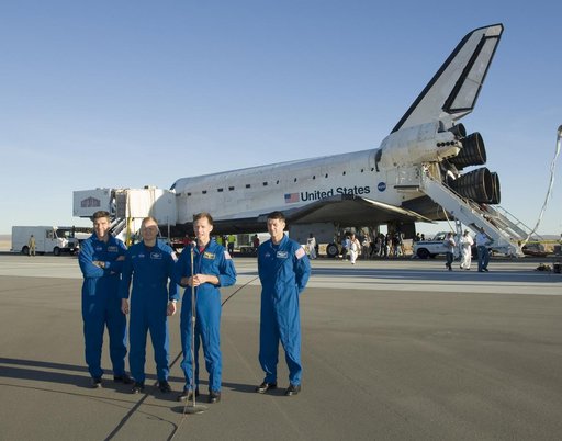 STS-126 commander Chris Ferguson, flanked by crewman Stephen Bowen, Eric Boe and Robert Kimbrough, offers comments on the mission after landing at Edwards AFB