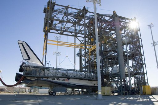 The Space Shuttle Endeavour is nestled in the Mate-DeMate Device at NASA DFRC as turnaround operations get underway for its ferry flight back to KSC in Florida