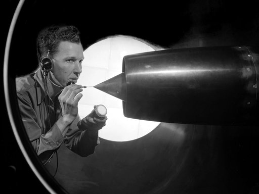 NACA Technician Cleans a Ramjet in 8- by 6-Foot Supersonic Wind Tunnel