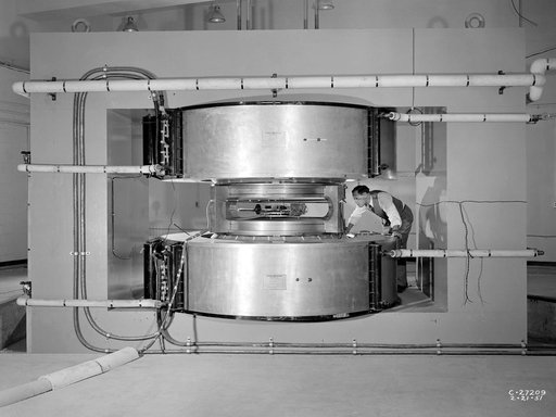 NACA Researcher Examines the Cyclotron