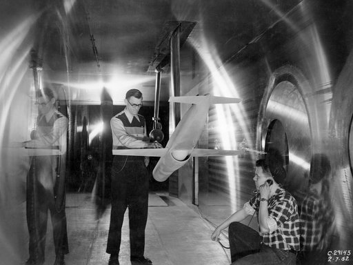 Ramjet Model and Technicians in the 8- by 6-Foot Supersonic Wind Tunnel