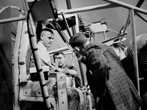 John Glenn Prepares for a Test in the Multi-Axis Space Test Inertia Facility