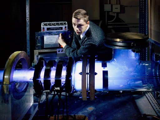 NASA Researcher Adjusts a Travelling Magnetic Wave Plasma Engine