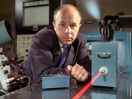 Researcher Determining a Ruby Laser’s Effect on a Crystal