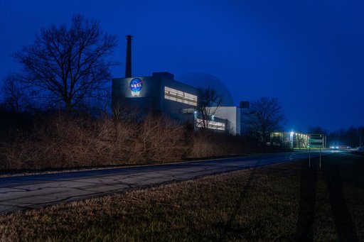 Evening photo of the Space Experiments Complex (SEC) at Armstron