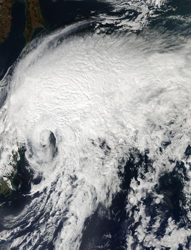 NASA's Aqua Satellite Sees Extra-Tropical Storm Vongfong Pulling Away from Hokkaido, Japan