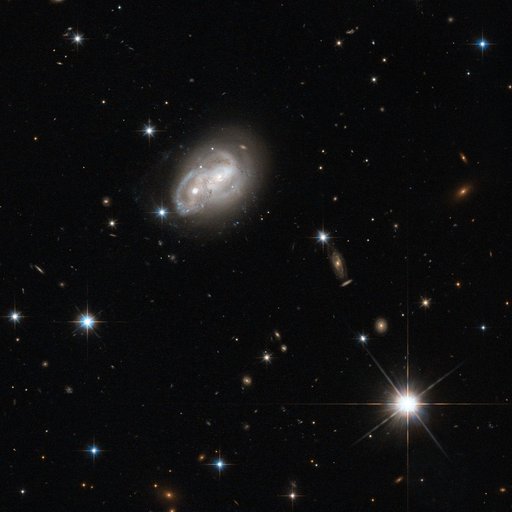 Hubble Eyes Galaxy as it Gets a Cosmic Hair Ruffling