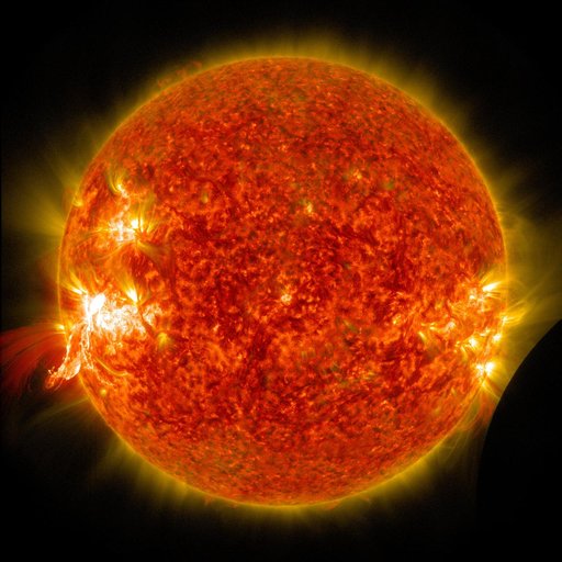 NASA's SDO Sees a Solar Flare and a Lunar Transit