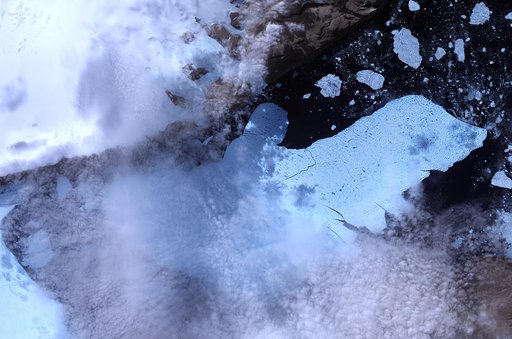 Ice Island Calves off Petermann Glacier