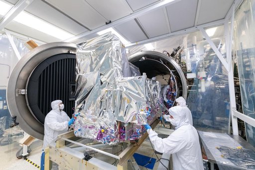 OCI is Pushed into Thermal Vacuum Chamber