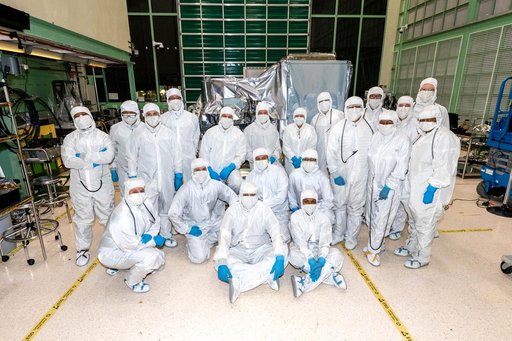 OCI Team Photo Pose with the Instrument Integrated to the Tilt Mechanism