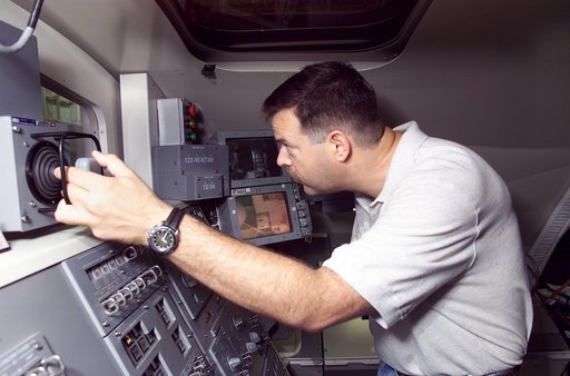 Views of STS-106 Pilot Scott Altman training with the RMS arm