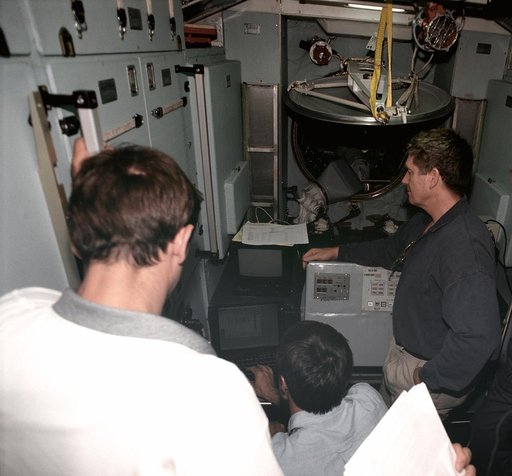 Expedition One crew in Russian with Service Module