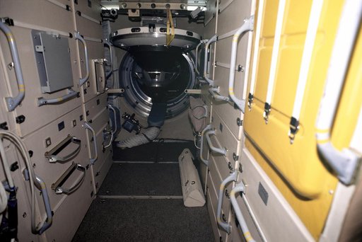 Expedition One crew in Russian with Service Module