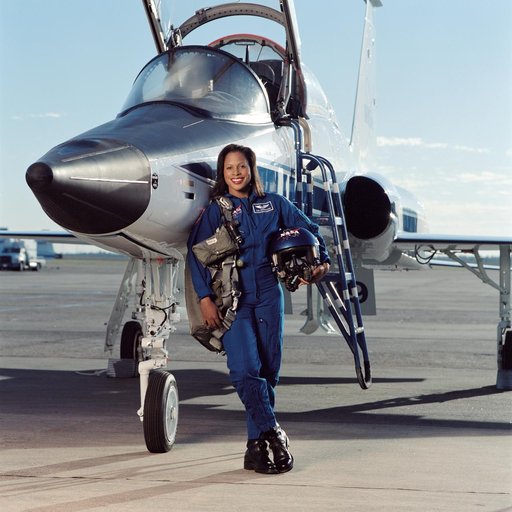 Joan Higginbotham posing in front of a T-38 aircraft and sitting in a T-38 cockpit