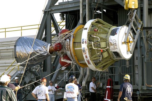 KENNEDY SPACE CENTER, FLA. - The second stage of the Delta II rocket is raised off the transporter for its lift up the launch tower on Pad 17-A, Cape Canaveral Air Force Station.  It will be mated to the first stage in preparation for the launch of the Mars Exploration Rover 2 (MER-A).  The MER Miss