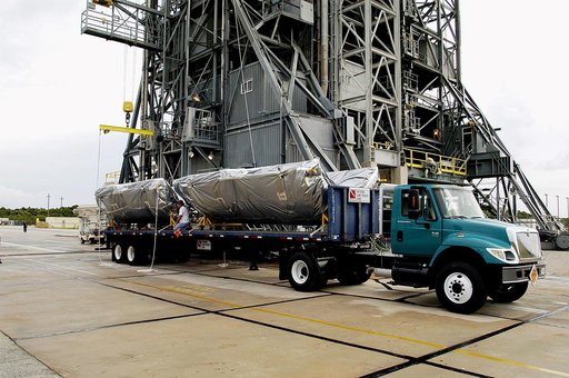 KENNEDY SPACE CENTER, FLA. -  The fairing for the Mars Exploration Rover 2 (MER-2/MER-A) arrives at Launch Complex 17-A, Cape Canaveral Air Force Station.  It will be installed around the payload for protection during launch.  The MER Mission consists of two identical rovers designed to cover roughl