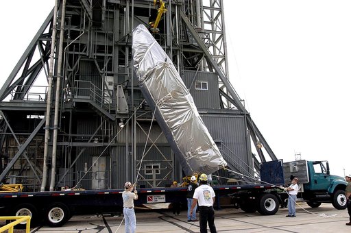 KENNEDY SPACE CENTER, FLA. - At Launch Complex 17-A, Cape Canaveral Air Force Station, the second half of the fairing for the Mars Exploration Rover 2 (MER-2/MER-A) is raised to a vertical position for its lift up the launch tower.  The fairing will be installed around the payload for protection dur