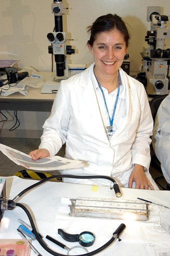 KENNEDY SPACE CENTER, FLA. -   Valerie Cassanto is one of the scientists recovering experiments found during the search for Columbia debris.  Included in the Commercial ITA Biomedical Experiments payload on mission STS-107 are urokinase cancer research, microencapsulation of drugs, the Growth of Bac