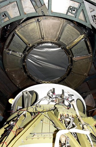 KENNEDY SPACE CENTER, FLA. -  On Launch Complex 17-B, Cape Canaveral Air Force Station, the Space Infrared Telescope Facility (SIRTF) observatory is being dismantled  from atop the Delta II rocket.  It will be taken back to NASA Spacecraft Hangar AE. SIRTF will remain in the clean room at Hangar AE 