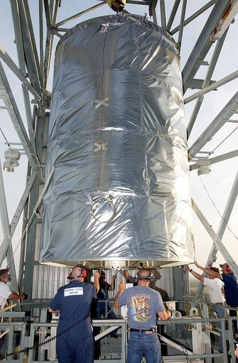 KENNEDY SPACE CENTER, FLA. - On Launch Complex 17-B, Cape Canaveral Air Force Station, the Space Infrared Telescope Facility (SIRTF) observatory is ready to be lowered to the ground and taken back to NASA Spacecraft Hangar AE. SIRTF will remain in the clean room at Hangar AE until it returns to the 