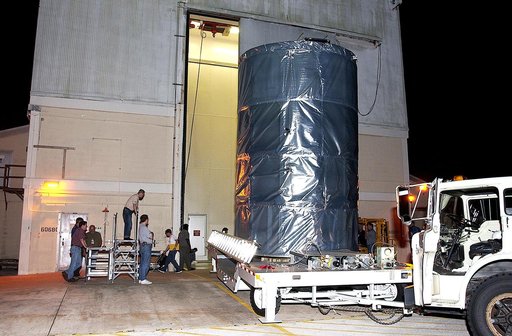 KENNEDY SPACE CENTER, FLA. -  On Launch Complex 17-B, Cape Canaveral Air Force Station, the Space Infrared Telescope Facility (SIRTF) observatory is on a transporter to be taken back to NASA Spacecraft Hangar AE. SIRTF will remain in the clean room at Hangar AE until it returns to the pad in early A