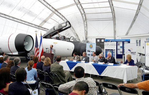 KENNEDY SPACE CENTER, FLA. -  At the airport in San Jose, Costa Rica, the NASA hangar is dedicated. The speaker is Hermann Faith, executive director, Costa Rica-USA (CRUSA) Foundation. At the table are (from left) Dr. Jorge Andres Diaz, head scientiest CARTA mission; Gary Shelton, NASA deployment ma