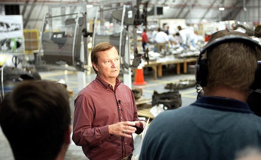 KENNEDY SPACE CENTER, FLA. - Shuttle Launch Director Mike Leinbach talks to the media in the RLV Hangar, site of the collection of Columbia debris undergoing examination.  The items shipped to KSC number more than 82,000 and weigh 84,800 pounds or 38 percent of the total dry weight of Columbia.  Of 