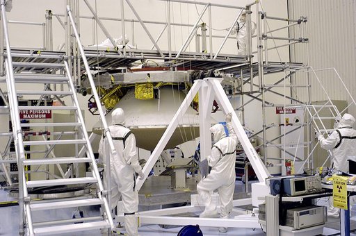 KENNEDY SPACE CENTER, FLA. - In the  Payload Hazardous Servicing Facility, the cruise stage is mated to the Mars Exploration Rover 2 (MER-2) entry vehicle.    The cruise stage includes fuel tanks, thruster clusters and avionics for steering and propulsion.  NASA's twin Mars Exploration Rovers are de