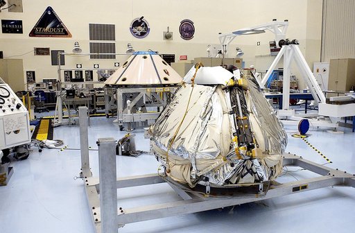 KENNEDY SPACE CENTER, FLA. -  The Mars Exploration Rover 1 (MER-1) is seen after installation of the air bags on the outside of the lander.  The airbags will inflate to cushion the landing of the spacecraft on the surface of Mars.  When it stops bouncing and rolling, the airbags will deflate and ret