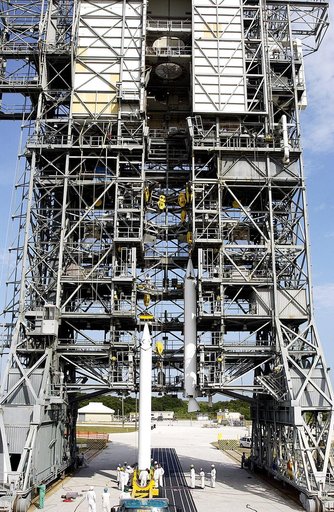 KENNEDY SPACE CENTER, FLA. -  A second solid rocket booster (SRB) is ready to be lifted up the launch tower  on Launch Complex 17-A, Cape Canaveral Air Force Station.  They are two of nine SRBs that will be mated to the Delta rocket to launch Mars Exploration Rover 2. NASA’s twin Mars Exploration Ro