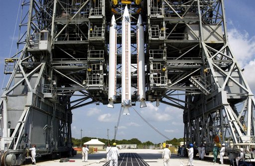 KENNEDY SPACE CENTER, FLA. -  Three solid rocket boosters (SRBs) are suspended in the launch tower on Launch Complex 17-A, Cape Canaveral Air Force Station,  prior to mating with the Delta II rocket for launch of Mars Exploration Rover 2 (MER-2). NASA’s twin Mars Exploration Rovers are designed to s